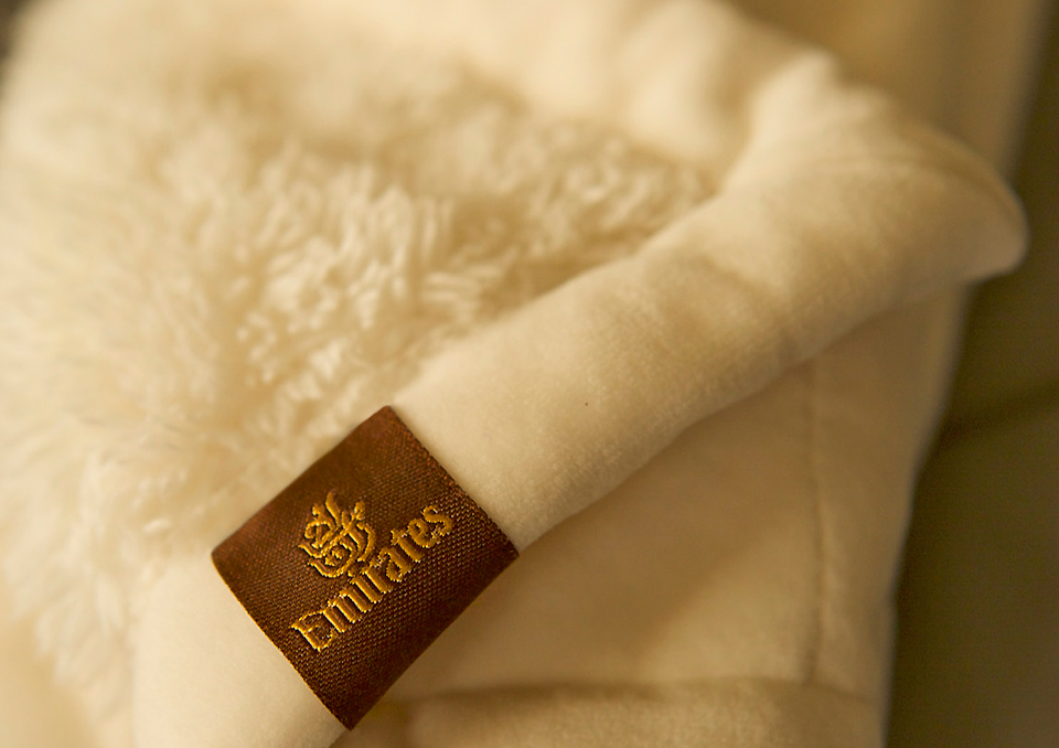 emirates-plush-faux-sheep-skin-blanket-in-first-class