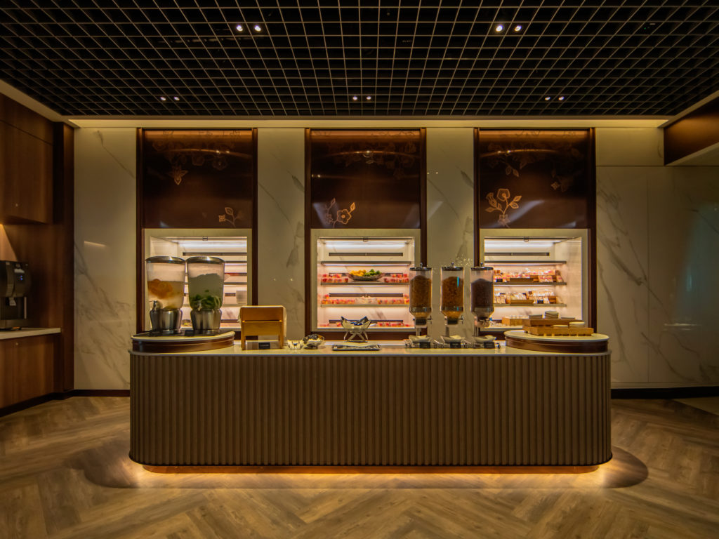 Snacks and beverage counter at the renovated Singapore Airlines Business Class lounge.